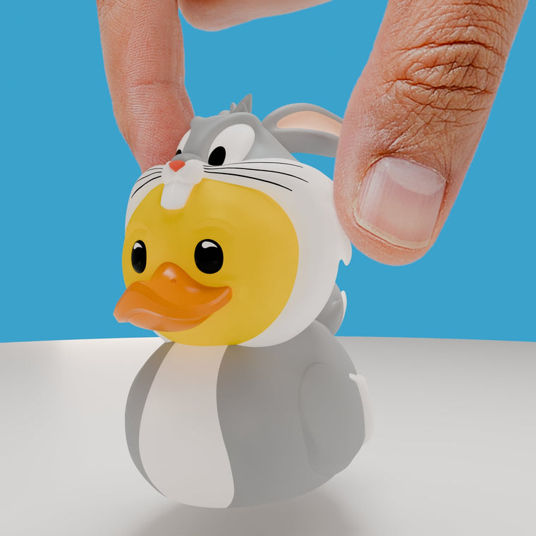 Looney Tunes Bugs Bunny TUBBZ Mini Edition collectible duck, held between finger and thumb to show its size