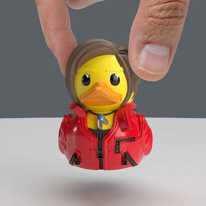 Resident Evil Claire Redfield TUBBZ Mini Edition collectible duck, held between finger and thumb to show its size