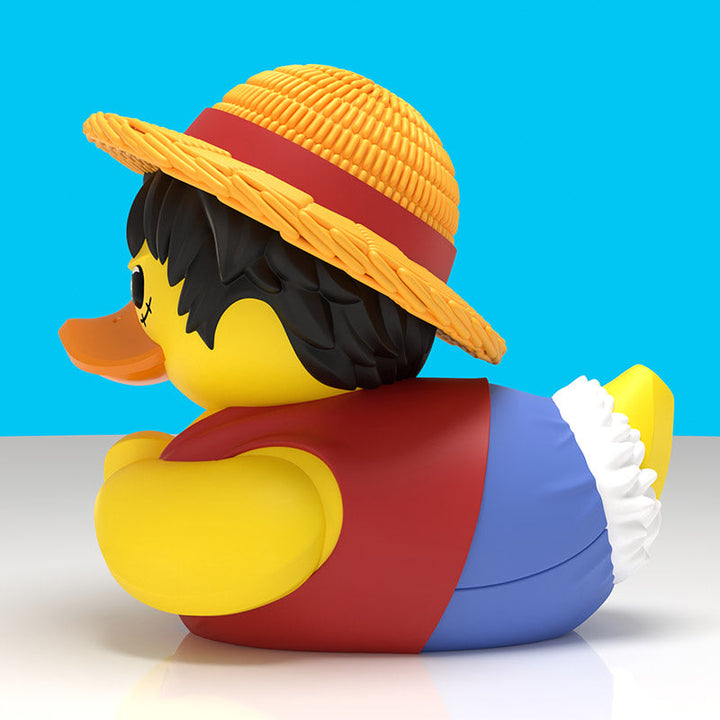 One Piece Monkey D. Luffy Boxed Edition TUBBZ, side profile with straw hat and blue shorts