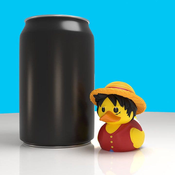 One Piece Monkey D. Luffy Mini TUBBZ, beside a drinks can to show its mini size