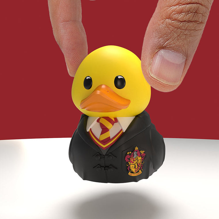Harry Potter Gryffindor TUBBZ Mini Edition collectible duck, held between finger and thumb to show its size