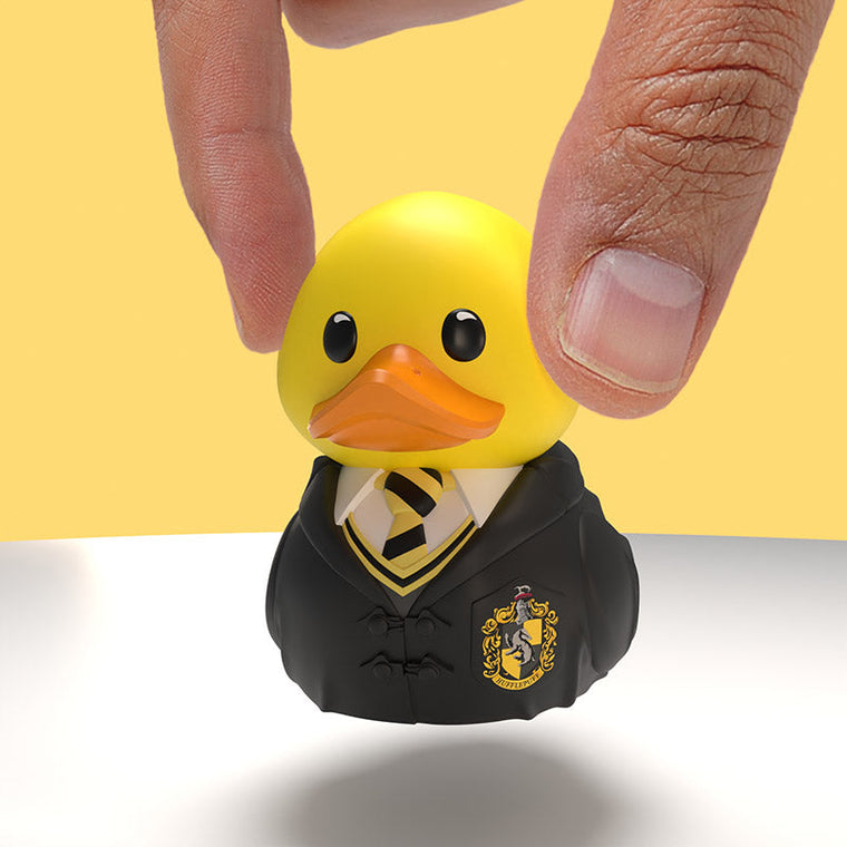 Harry Potter Hufflepuff TUBBZ Mini Edition collectible duck, held between finger and thumb to show its size