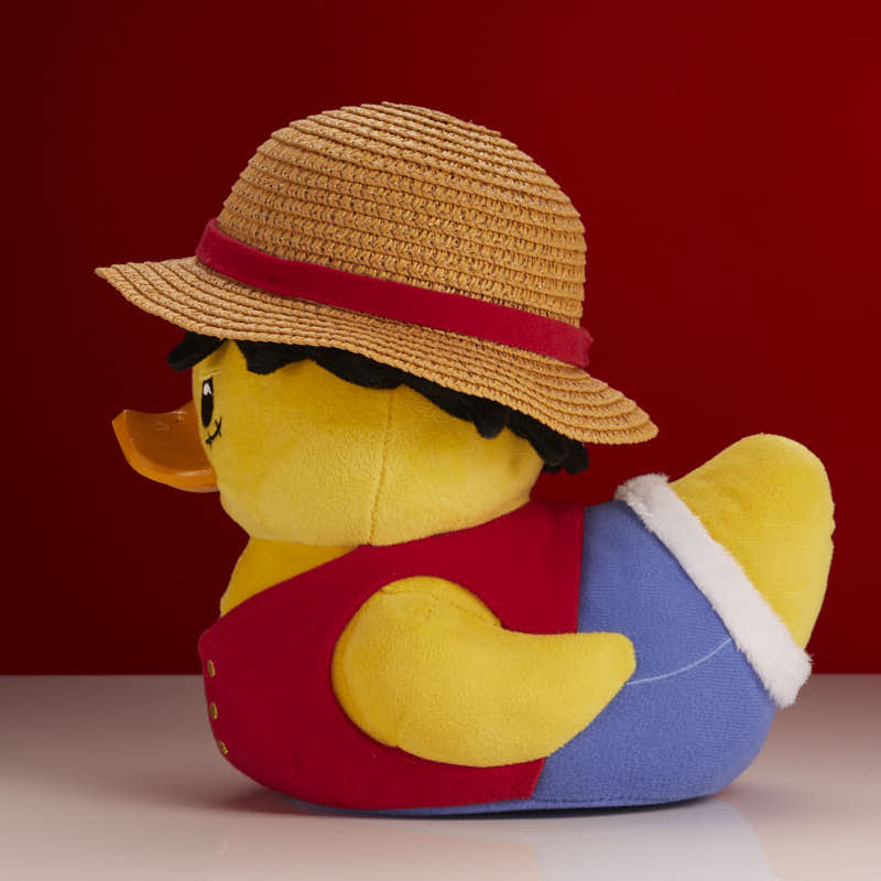 One Piece Monkey D. Luffy TUBBZ plush duck, left side profile showing blue shorts
