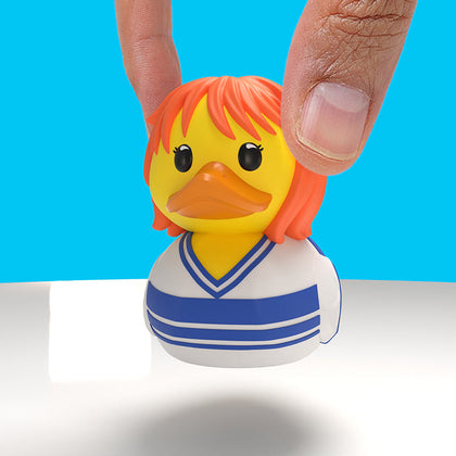 One Piece Nami Mini TUBBZ, held between finger and thumb to show its small size