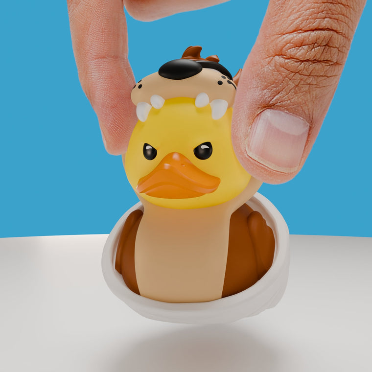 Looney Tunes Tasmanian Devil TUBBZ Mini Edition collectible duck, held between finger and thumb to show its size