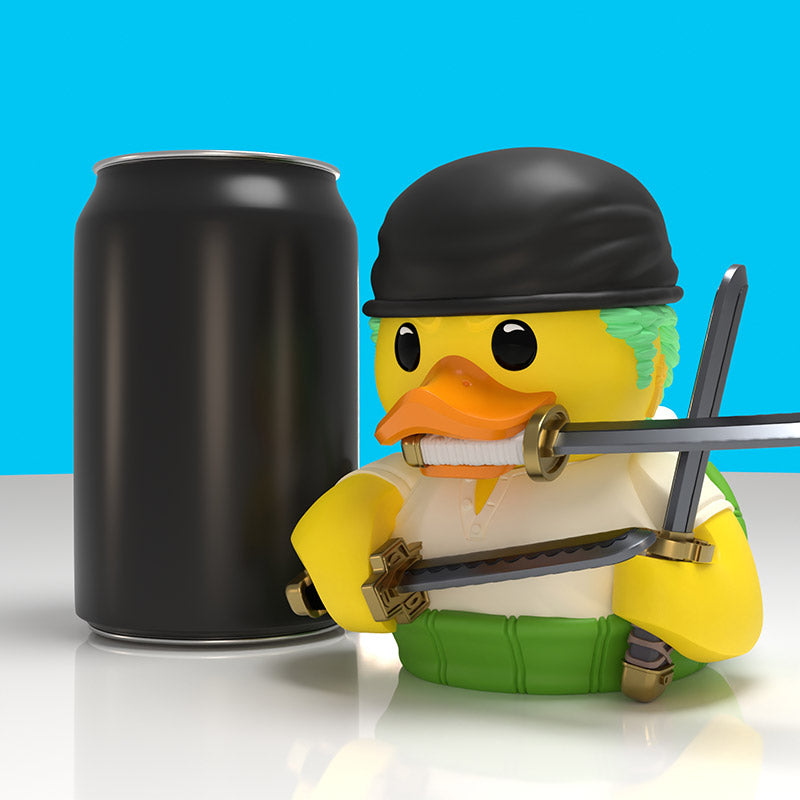 One Piece Roronoa Zoro Collector's Edition TUBBZ, beside a drinks can for scale