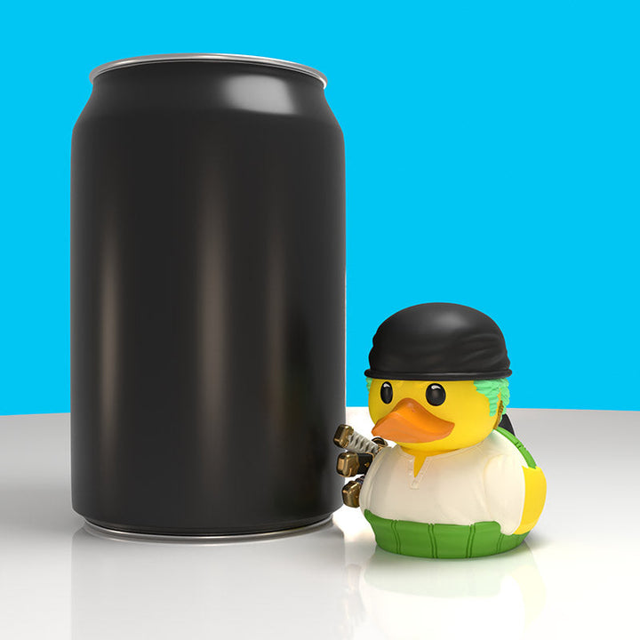 One Piece Roronoa Zoro Mini TUBBZ, beside a drinks can to show its mini size
